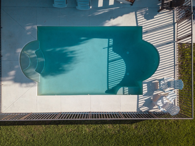 Custom geometric swimming pool design viewed from above by Emerald Isle Pools